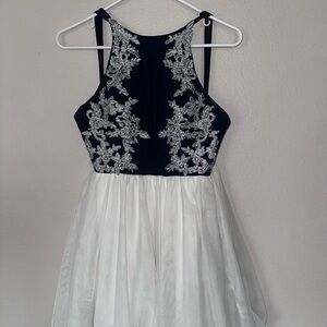 Elegant Black and White Dress with Silver Embroidery